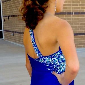 Beautiful blue prom dress! Slit down leg, beautiful jeweled top. Worn once.